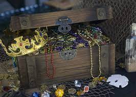 An old skiff can serve as a sandbox and becomes a pirate ship with a mast and ships wheel found on homebunch.com. Best Diy Pirate Party Ideas Diy Inspired
