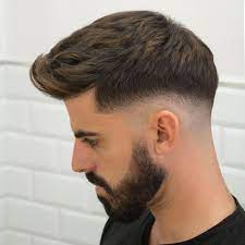 It is a kind of taper fad that starts at the middle of the scalp leaving a bunch of thick hair at the top of the scalp. Hairstyle Trends 29 Different Types Of Haircuts On The Radar Right Now Photos Collection Types Of Fade Haircut Faded Hair Fade Haircut