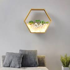 Look for outdoor light fixtures that complement the overall structure and look of your home. Metal Hexagon Wall Mount Light With Artificial Succulents Led Modern Wall Light Fixture Takeluckhome Com