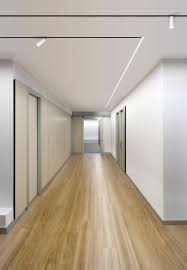 These types of lights are usually connected via a transformer to a power source, and are tensioned from wall to wall or from ceiling to floor. Flos Architectural Redefines Track Lighting