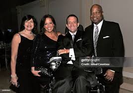 Abby Sims, Stacey Skordan, Alan Brown, and Dave Sims attend ...