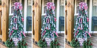 Tape the bottom of your tomato cage to make a point on the top of the tree. Easily Make Diy Tomato Cage Christmas Trees On A Budget
