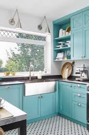 The hexagon look backsplash tiles are in harmony with a simple modern golden hexagon lighting fixtures! 23 Teal Kitchen Cabinet Ideas Sebring Design Build