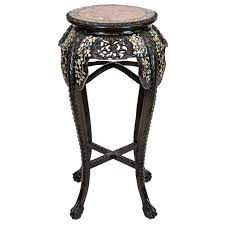 It has oriental accent around the apron and the legs. Chinese Rosewood Inlaid Plant Stand For Sale At 1stdibs