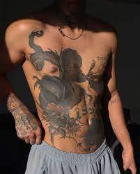 Full stomach tattoos for women. 48 Classy Chest And Stomach Tattoos