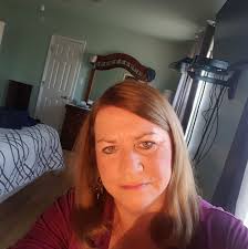 Should I wait to relocate my Christmas cactus until it is fully bloomed?