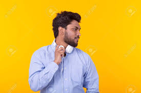 From the google reports, he is the most searched south indian actor in the year 2019. Handsome Relaxed Indian Man With Beard Is Listening To Favorite Music At The Earphones On Yellow Background With Copy Space Music Subscription Concept And Online Radio Stock Photo Picture And Royalty Free