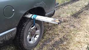 The idea is to make the mud rut less steep so your car can climb out. Driver Makes Clever Lifehack To Get Out Of Mud Stuck In The Mud Mud Car Stick