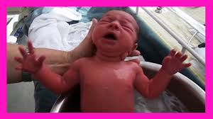 That way, it will be warm while you dry them off once they are all. Newborn Baby Girl S First Bath Youtube Video Youtube