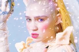 People know grimes and her partner elon musk individually and together for their eccentricities. Grimes Debuts White Ink Alien Scars Back Tattoo