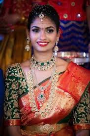 This stunning pine green gadwal silk saree with gold zari bhuttas is handwoven by the finest craftsmen. 57 Red Saree Green Blouse Ideas Saree Blouse Designs Bridal Blouse Designs Blouse Designs