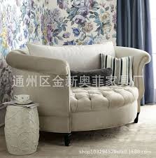 The curves of the long oval table shape are contrasted by the several vertical black iron bars that cover the table like a cage, save for the front center. American Oval Sofa European Single Small Sofa Velvet Fabric Buckle Living Room Neo Classical Arc Lounge Chair Zoppah Com Zoppah Online