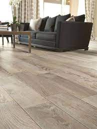Modern Living Room Floor Tile That Looks Like Wood A Nice Alternative To Hardwood Or Laminate Hardwoo Living Room Tiles Gray Wood Tile Flooring Flooring
