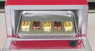 A burger and fries appear. Nestle Japan Introduces New Kit Kat Pizza Oven Bake Version Of 2 Fingered Classic Daily Mail Online