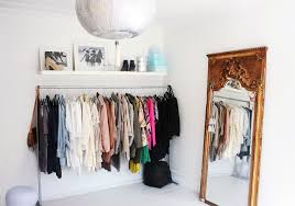 Take storage to the ceiling by securing a few shelves or storage cubbies high above your bed to create a statement piece no one can ignore. How To Store Clothes When You Don T Have A Closet