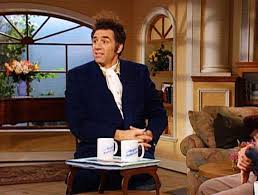 Kramer Displaying His Coffee Table Book On Coffee Tables On Regis Kathie Lee Seinfeld Seinfeld Seinfeld Kramer Funny Photos