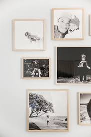 Black And White Family Photo Gallery Wall To Mat Or Not To Mat Black And White Photo Wall Gallery Wall Frames Master Bedroom Nursery