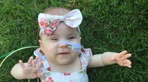 Girl, 2, battled tumours that wrapped around her spine and cut off airways 