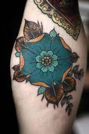 Maybe you would like to learn more about one of these? Stylized Flower Tattoo Orange Bronze Petrol Green Blue Blue Flower Tattoos Vintage Style Tattoos Tattoos