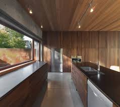 La Maison Beaumont By Henri Cleinge Architecte Wall Of Window Leading To Door Door Directly Into Ki Beaumont House Interior Design Kitchen Kitchen Interior