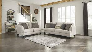 Buying furniture as part of a set can save you money since you'll typically get a discount for ordering several matching pieces. Ashley Furniture Alcona 121398312 Beige Sofa And Loveseat Set Sam Levitz Furniture Stationary Living Room Groups