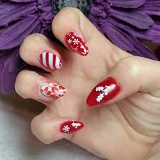You can paint half of your red nails with shiny gold to have these extra shiny and glossy red and gold nails. 36 Christmas Nail Designs Ideas Design Trends Premium Psd Vector Downloads