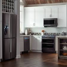 Green patterned bar stools sit at a dark wood kitchen island that complements with the upper cabinets. 12 Gorgeous Slate Appliances With White Cabinets Ideas For Inspirations Jimenezphoto