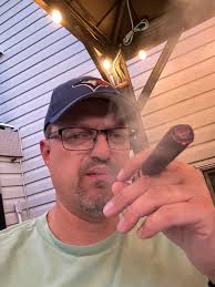 Enjoying a well aged Torano Exodus 59 while watching a mink play in the  creek and a few deer passing through. Smoke tent relaxation never lets me  down