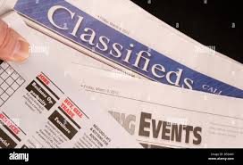 Newspaper classified ads hi-res stock ...
