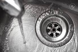 stainless steel sink plug hole close up