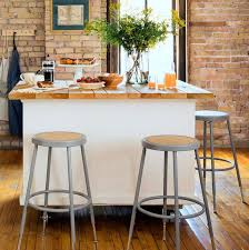 A brilliant ikea hack, this waterfall kitchen island made from textured wood neatly tucks in another mini kitchen island with inlets and wheels. 15 Diy Kitchen Islands Unique Kitchen Island Ideas And Decor