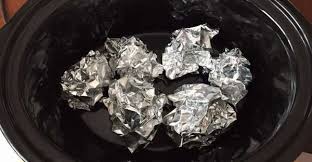 She Puts Aluminum Foil Balls In The Crock Pot When We See Why Genius Stuffed Whole Chicken Crockpot Crock Pot Slow Cooker