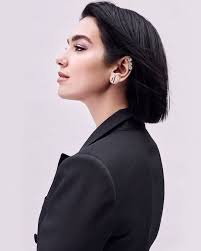 Dua Lipa photographed by Nabil Elderkin for YSL Beauty's "LIBRE" fragrance  campaign