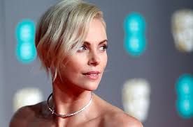 Charlize Theron's Super Bowl 'mystery man' revealed