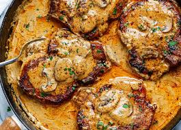 Spoon sauce over chops and serve with cooked rice. Garlic Pork Chops Recipe In Creamy Mushroom Sauce How To Cook Pork Chops Eatwell101