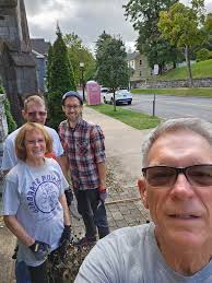 We were a small group that gathered this morning to mulch but we were  determined. Since our number was small we weren't able to do everything.  The Trustees would like to thank