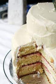 Zesty lemon cake, mint choc chip, coconut marble cake. Classic Wedding Cake With Raspberry Filling And Buttercream Icing Wedding Cake Recipe Cake Recipes Cake Flavors