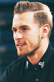 He plays as a midfielder for juventus and the wales national football team. Aaron Ramsey Soccer Player Hairstyles Mens Hairstyles Ramsey