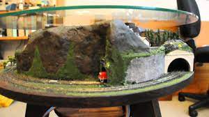 I didn't like the white so i painted about 95% of it black. Z Scale Annular Coffee Table Layout