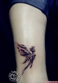 Keep a very good rapport with your artist. Black Ink Flying Fairy Tattoo Design For Leg