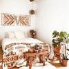 In the guest bedroom of ronnie dunn's tennessee barn home, a rope bed anchors the space. 3