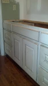 However, back you use such a arresting actual for your cabinets, allotment the appropriate countertop to brace it with can be a challenge. White Painted And Distressed Knotty Alder Cabinets Alder Cabinets Knotty Alder Cabinets Cottage Kitchen Cabinets