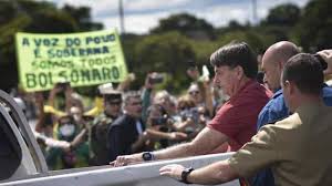 How jair bolsonaro's military career came to an end. Brazil President Bolsonaro Mixes With Crowds Again In Push To Reopen Economy Hindustan Times