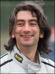 A dotcom billion? He'd rather race his Ferrari