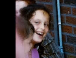 My older brothers, sister, and I. Taken in our backyard