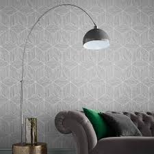 The textured wallpaper adds depth to the entertainment center and ties in with the gray accents used throughout the design. Grasscloth Geo Grey Wallpaper Grey Wallpaper Graham Brown
