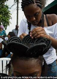 Stunning Hairstyles Inspired By Slavery Women Do Battle With Their Children S Plaits In Colourful Colombian Hair Hair Contest Hair Styles African Hair History