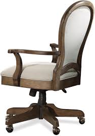 The chair is upholstered in a faux leather in a white color with decorative horizontal patterns on the back. Riverside Home Office Round Back Upholstered Desk Chair 15838 Watts Furniture Galleries