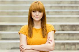 If you want to get straight bangs with curly hair, you can vouch for this hairstyle as full bangs highlight your eyes and give a stark contrast to your loose curls. How To Style Straight Hair With Bangs And 10 Looks To Inspire You