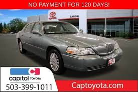 Image result for Light Ice Blue 2005 Town Car